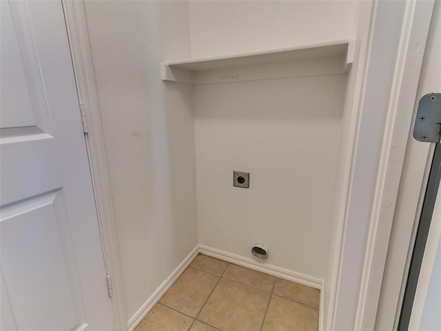 16020 Panther Way, Edmond, OK 73013 - washroom featuring electric dryer hookup, light tile patterned flooring, and baseboards