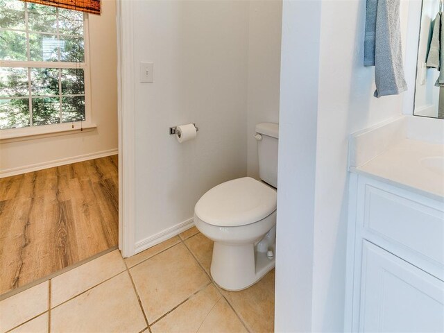 16020 Panther Way, Edmond, OK 73013 - bathroom featuring toilet, vanity, tile patterned floors, and baseboards