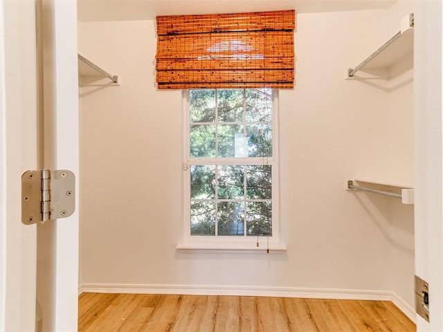 16020 Panther Way, Edmond, OK 73013 - spacious closet with light wood-style flooring
