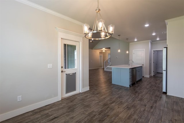 14601 Chambord Dr, Yukon, OK 73099 - kitchen with a sink, a chandelier, light countertops, baseboards, and an island with sink