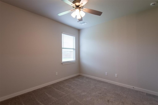 14601 Chambord Dr, Yukon, OK 73099 - carpeted empty room with a smoke detector, baseboards, and ceiling fan
