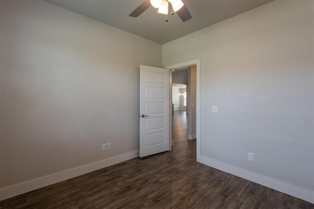 14601 Chambord Dr, Yukon, OK 73099 - unfurnished room with baseboards, ceiling fan, and dark wood-style floors