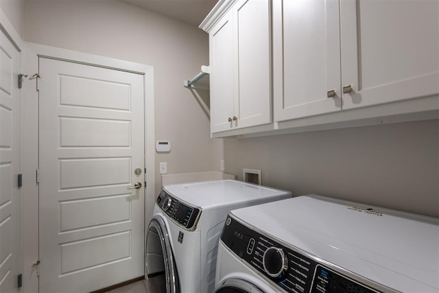 14601 Chambord Dr, Yukon, OK 73099 - laundry area featuring washing machine and dryer and cabinet space