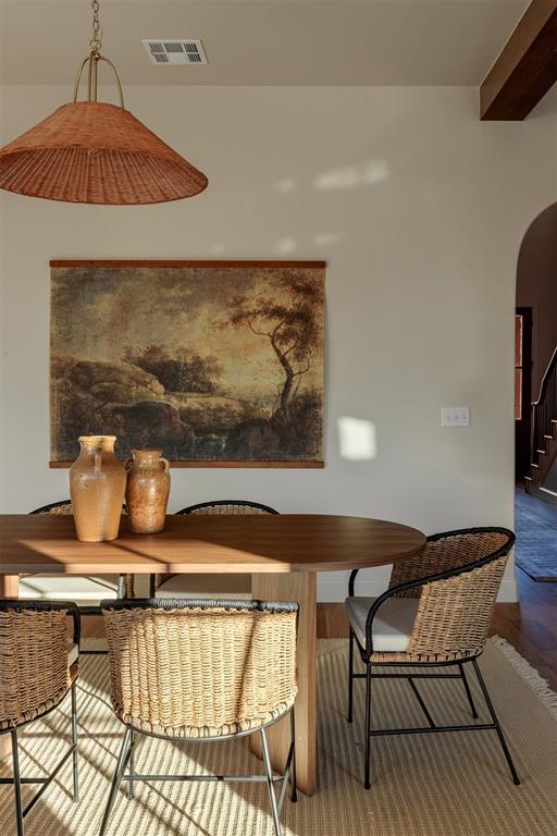 3817 Shady Hill Trl, Edmond, OK 73034 - dining room with arched walkways and stairway