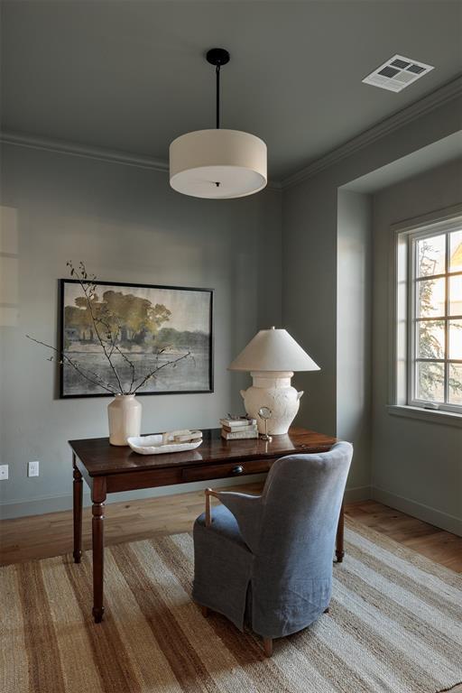 3817 Shady Hill Trl, Edmond, OK 73034 - office featuring wood finished floors, ornamental molding, and baseboards