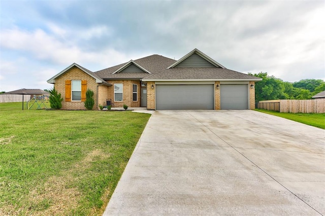 715 SE 37th St, Newcastle, OK 73065 - view of front facade with brick siding, driveway, a garage, and a shingled roof