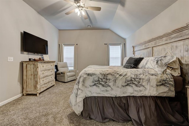 715 SE 37th St, Newcastle, OK 73065 - bedroom with light colored carpet, multiple windows, ceiling fan, baseboards, and vaulted ceiling