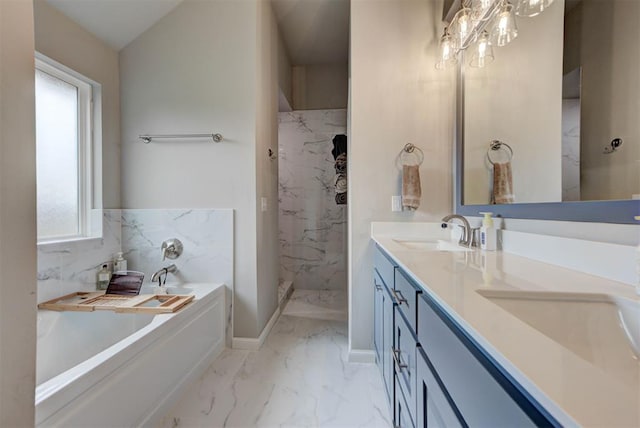715 SE 37th St, Newcastle, OK 73065 - bathroom with marble finish flooring, double vanity, a marble finish shower, a garden tub, and a chandelier