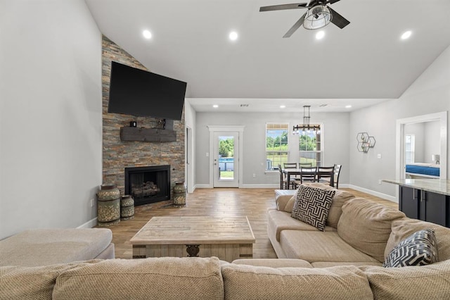 2382 County Road 1262, Blanchard, OK 73010 - living area with light wood-type flooring, recessed lighting, a stone fireplace, a ceiling fan, and baseboards