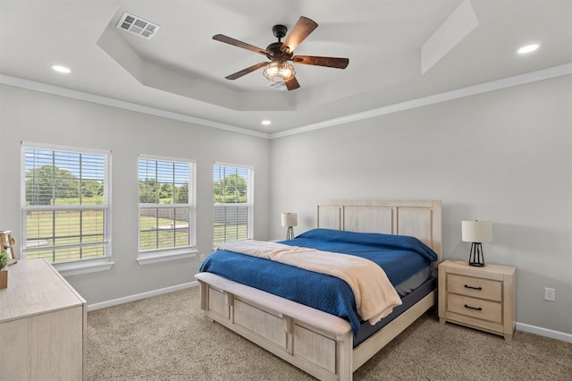 2382 County Road 1262, Blanchard, OK 73010 - carpeted bedroom featuring a raised ceiling, multiple windows, baseboards, recessed lighting, and ornamental molding