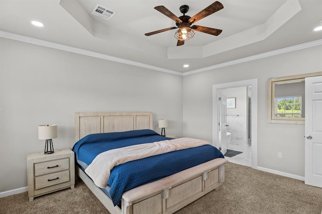 2382 County Road 1262, Blanchard, OK 73010 - carpeted bedroom featuring a raised ceiling, recessed lighting, ornamental molding, baseboards, and ensuite bathroom
