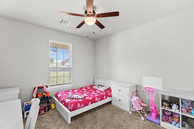 2382 County Road 1262, Blanchard, OK 73010 - carpeted bedroom with a ceiling fan
