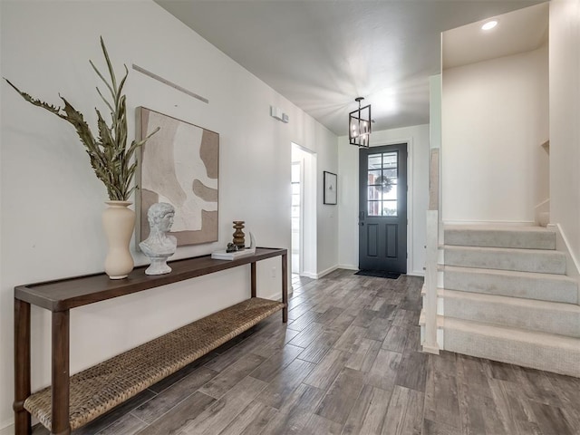 2257 Preserve Edge Dr, Edmond, OK 73034 - entryway featuring wood finished floors, stairway, baseboards, and a chandelier