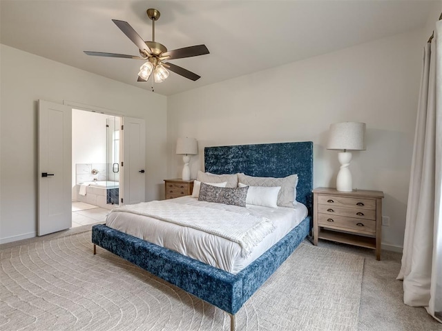 2257 Preserve Edge Dr, Edmond, OK 73034 - bedroom featuring carpet flooring, baseboards, ensuite bathroom, and a ceiling fan