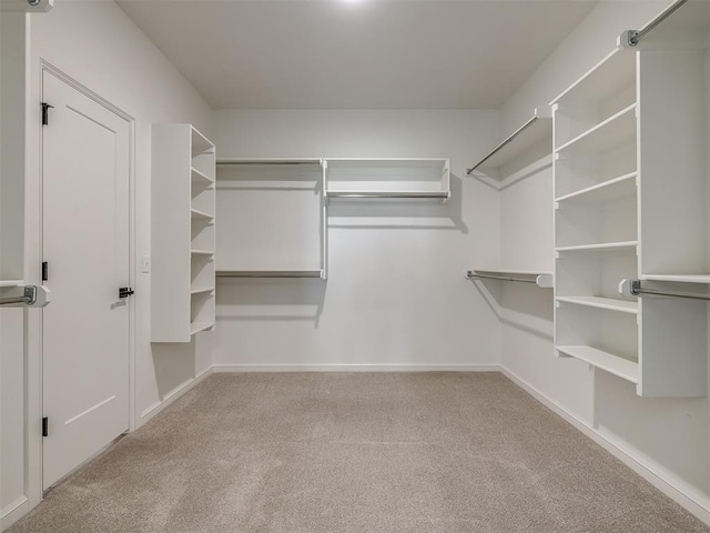 2257 Preserve Edge Dr, Edmond, OK 73034 - spacious closet featuring carpet