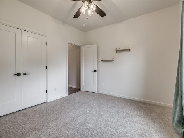 2257 Preserve Edge Dr, Edmond, OK 73034 - unfurnished bedroom with carpet, baseboards, a closet, and ceiling fan