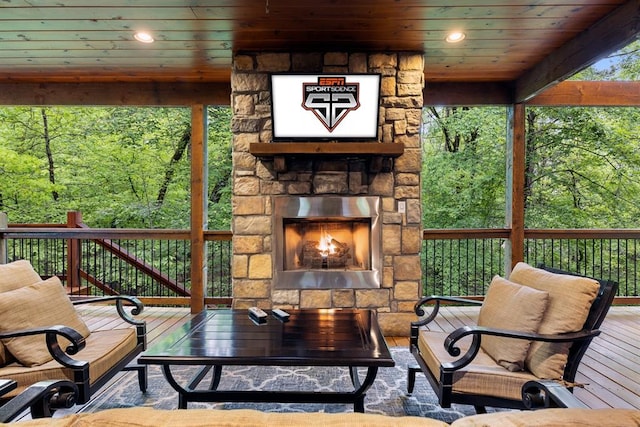 186 W Eagle Mountain Trl, Broken Bow, OK 74728 - wooden terrace featuring an outdoor stone fireplace