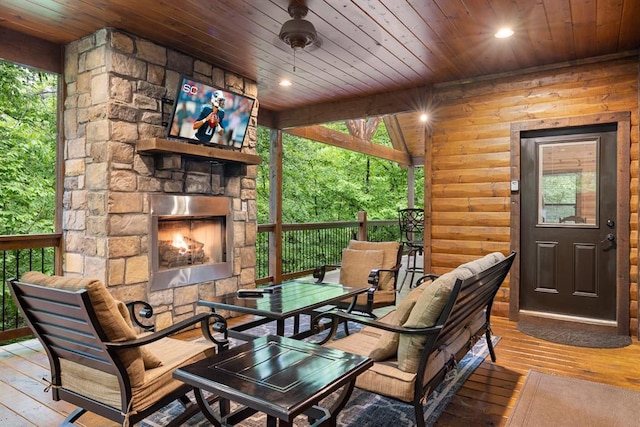 186 W Eagle Mountain Trl, Broken Bow, OK 74728 - deck featuring an outdoor stone fireplace