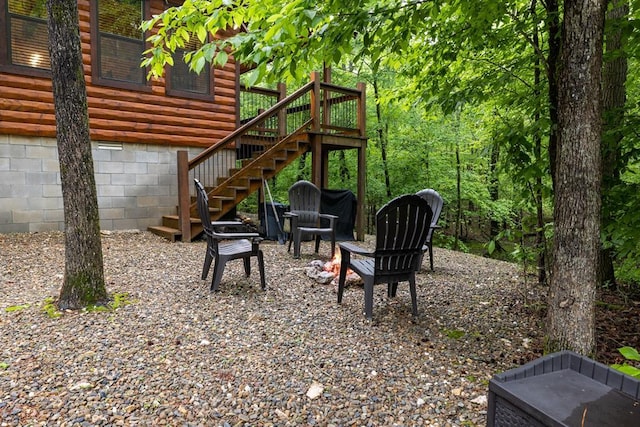 186 W Eagle Mountain Trl, Broken Bow, OK 74728 - view of patio featuring stairway