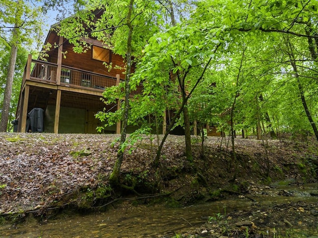 186 W Eagle Mountain Trl, Broken Bow, OK 74728 - back of property with a wooden deck