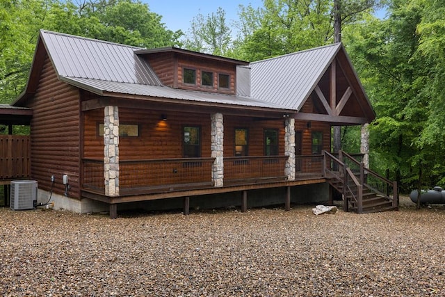 186 W Eagle Mountain Trl, Broken Bow, OK 74728 - view of front of home featuring a porch, a metal roof, and log veneer siding