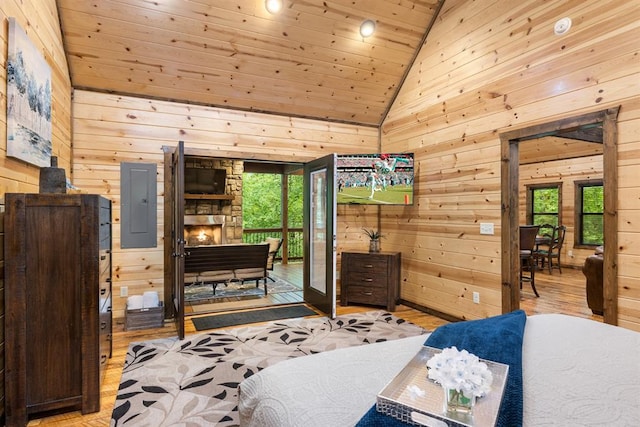 186 W Eagle Mountain Trl, Broken Bow, OK 74728 - bedroom with wood walls, electric panel, wood finished floors, access to exterior, and wooden ceiling