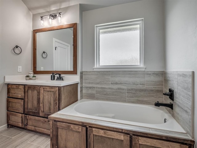 11052 NW 21st St, Yukon, OK 73099 - bathroom with vanity and a garden tub