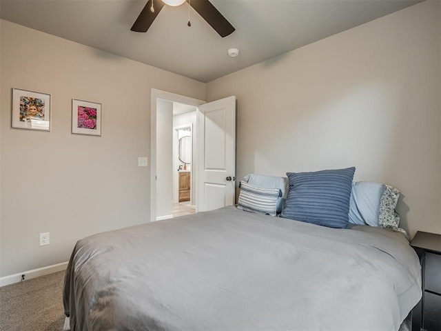 11052 NW 21st St, Yukon, OK 73099 - carpeted bedroom featuring baseboards and a ceiling fan