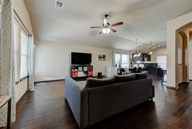2345 NW 191st Ct, Edmond, OK 73012 - living area with lofted ceiling, a ceiling fan, dark wood-type flooring, and baseboards