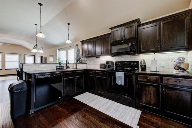 2345 NW 191st Ct, Edmond, OK 73012 - kitchen featuring black appliances, vaulted ceiling, a sink, backsplash, and dark wood finished floors