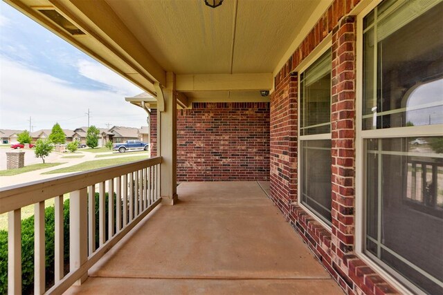 2345 NW 191st Ct, Edmond, OK 73012 - covered porch featuring a residential view