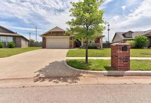 2345 NW 191st Ct, Edmond, OK 73012 - view of property hidden behind natural elements with driveway, brick siding, and an attached garage