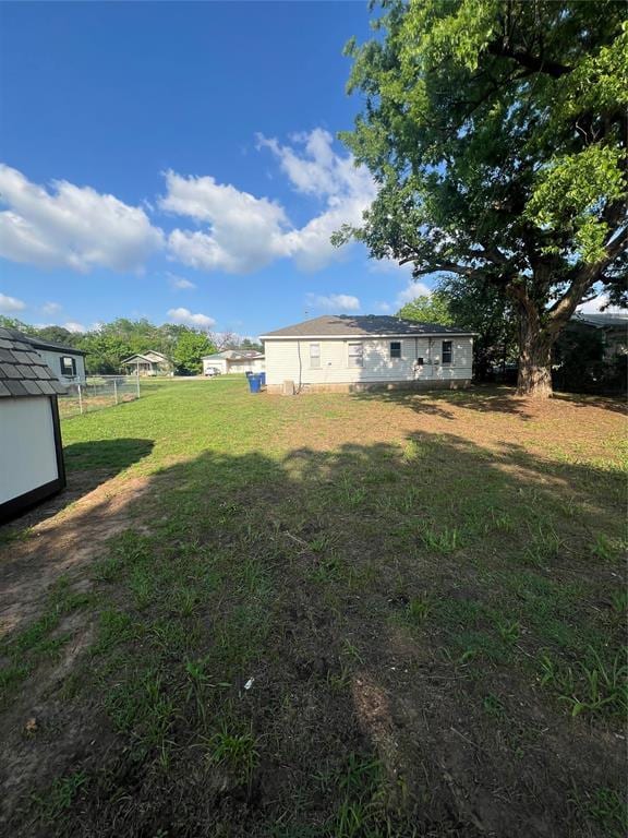 414 N 1st St, Tecumseh, OK 74873 - view of green lawn with an outbuilding