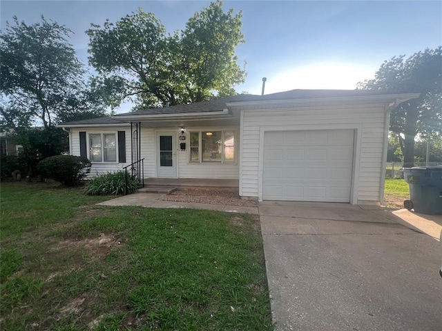 414 N 1st St, Tecumseh, OK 74873 - single story home featuring driveway, an attached garage, and a front yard