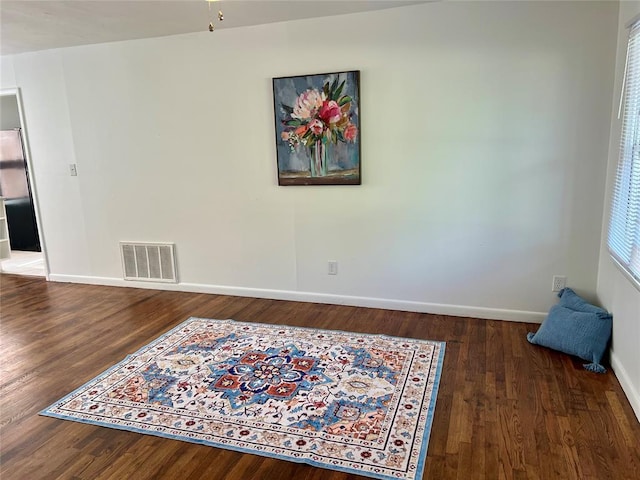 414 N 1st St, Tecumseh, OK 74873 - spare room with baseboards and wood finished floors