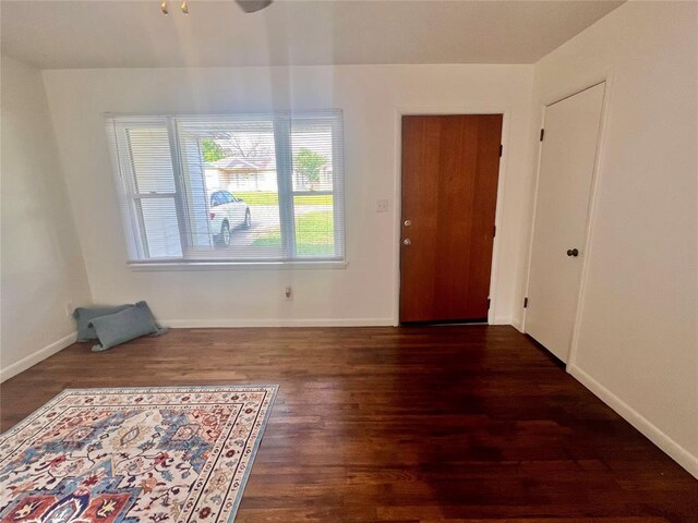 414 N 1st St, Tecumseh, OK 74873 - entryway with wood finished floors, baseboards, and a ceiling fan