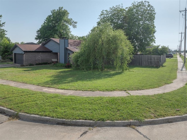 3501 Necia St, Moore, OK 73160 - view of yard with a garage