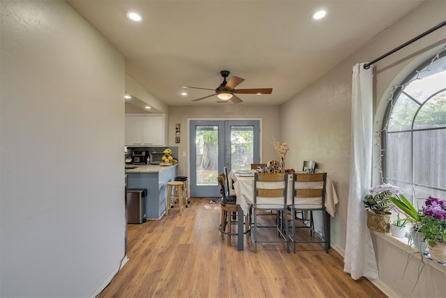 3501 Necia St, Moore, OK 73160 - dining area with ceiling fan, light wood finished floors, recessed lighting, french doors, and baseboards
