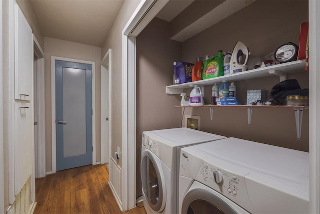 3501 Necia St, Moore, OK 73160 - washroom with washer and clothes dryer and wood finished floors