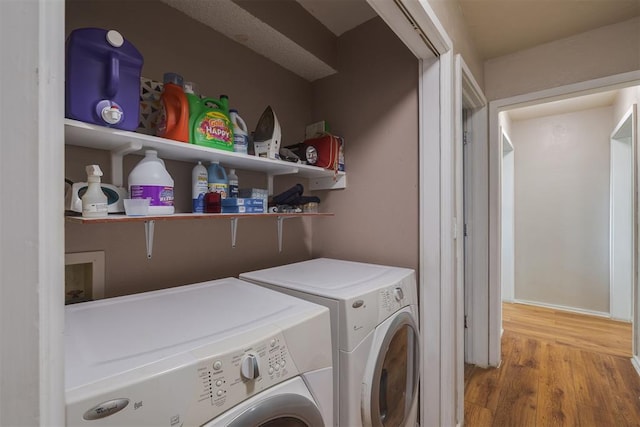 3501 Necia St, Moore, OK 73160 - washroom featuring washer and dryer and wood finished floors