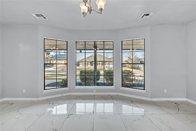 8116 NW 82nd St, Oklahoma City, OK 73132 - unfurnished room with light marble finish floors, baseboards, and a chandelier