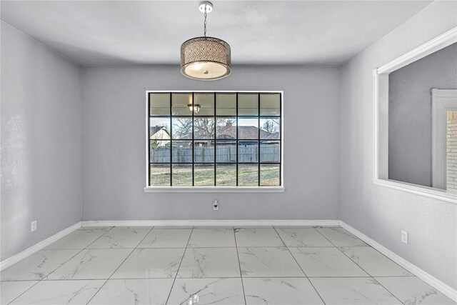 8116 NW 82nd St, Oklahoma City, OK 73132 - empty room with marble finish floors and baseboards