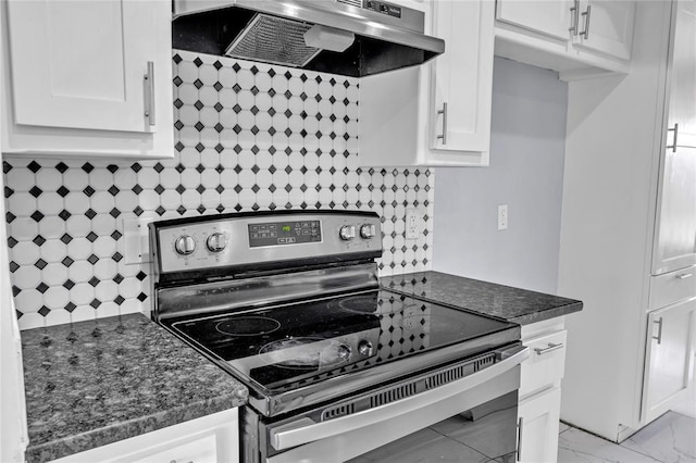 8116 NW 82nd St, Oklahoma City, OK 73132 - kitchen with stainless steel electric range, under cabinet range hood, white cabinetry, and tasteful backsplash