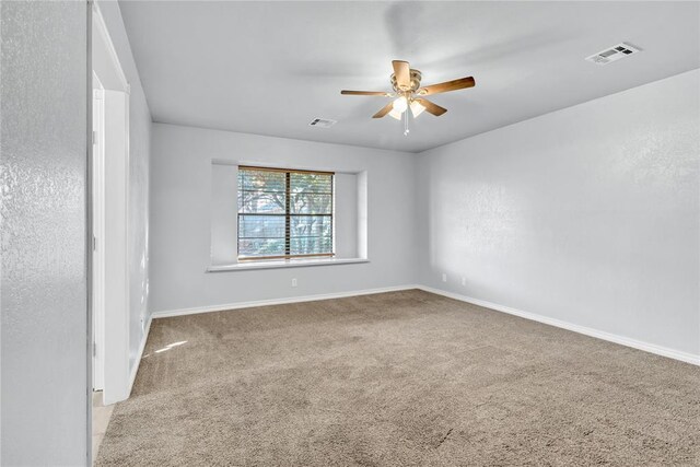 8116 NW 82nd St, Oklahoma City, OK 73132 - unfurnished room featuring carpet, a ceiling fan, and baseboards