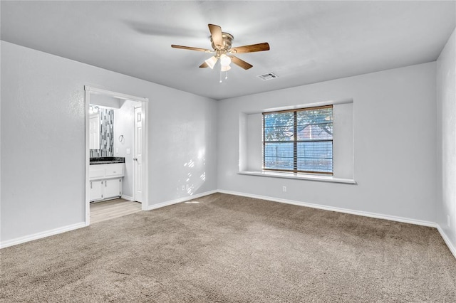 8116 NW 82nd St, Oklahoma City, OK 73132 - unfurnished room with light carpet, ceiling fan, and baseboards