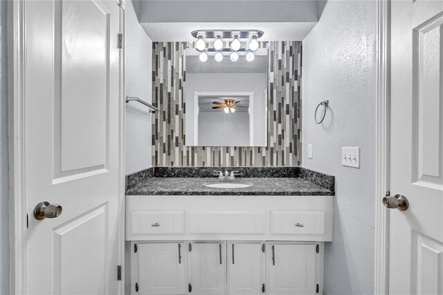 8116 NW 82nd St, Oklahoma City, OK 73132 - bathroom featuring vanity and a textured wall