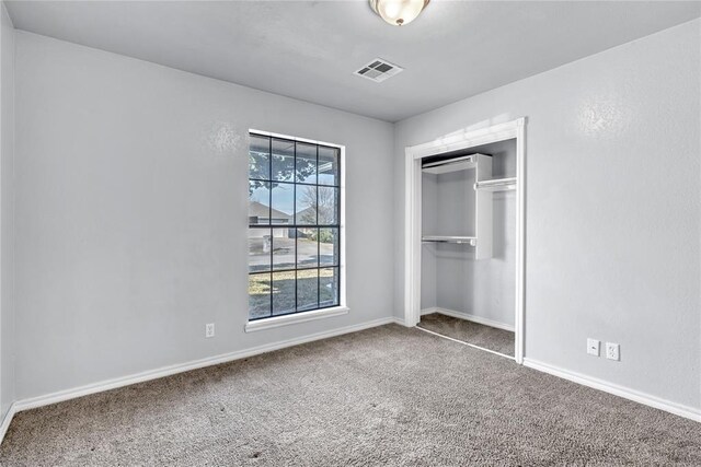 8116 NW 82nd St, Oklahoma City, OK 73132 - unfurnished bedroom with carpet flooring, baseboards, and a closet