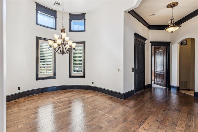 3101 Monica Ln, Moore, OK 73160 - entryway featuring a chandelier and wood-type flooring