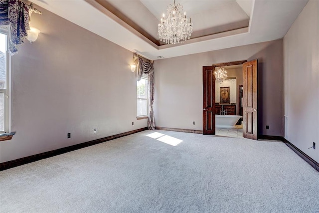 3101 Monica Ln, Moore, OK 73160 - spare room with a chandelier and carpet