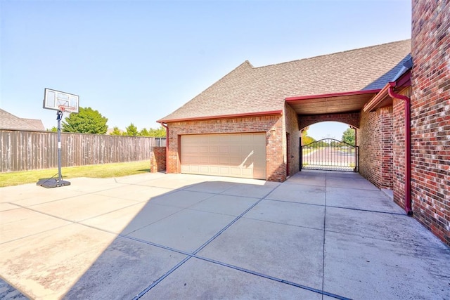 3101 Monica Ln, Moore, OK 73160 - garage with driveway and a gate